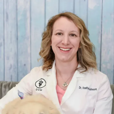 Dr. Heather Johnson WITH A DOG